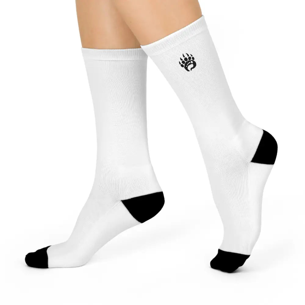 Basic crew socks in white with black toe heel accents and paw print logo