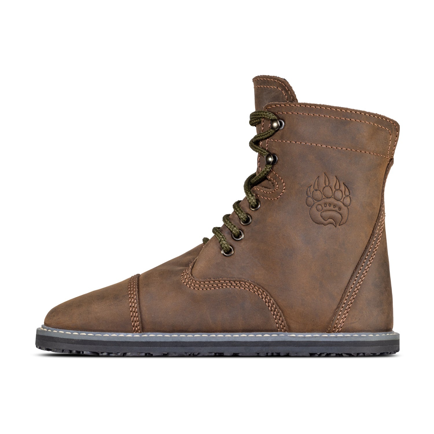 A Bruin leather boot with green laces and a wide toe-box, featuring an embossed paw print logo on the side, isolated on a white background by Bearfoot.