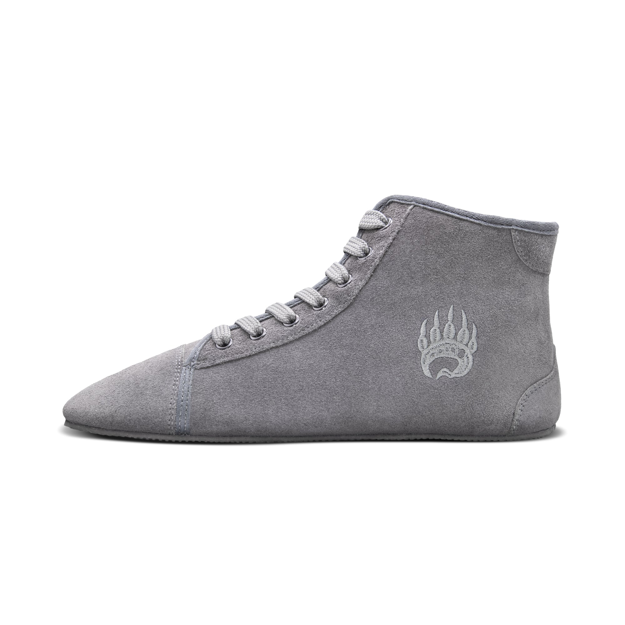 A single light gray Bearfoot Ursus Suede High-Top training sneaker with a black sole and multiple laces. The sneaker features a minimalist bear paw logo on the side, ideal for