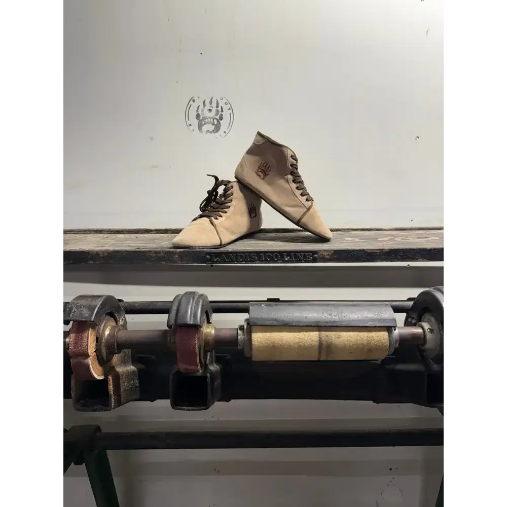 Bearly Used Footwear beige canvas high-top sneakers with minor imperfections