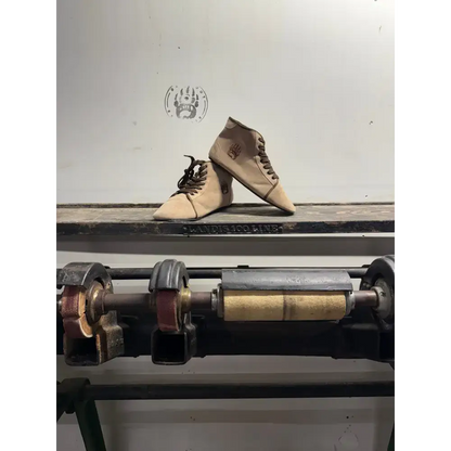 Bearly Used Footwear beige canvas high-top sneakers with minor imperfections