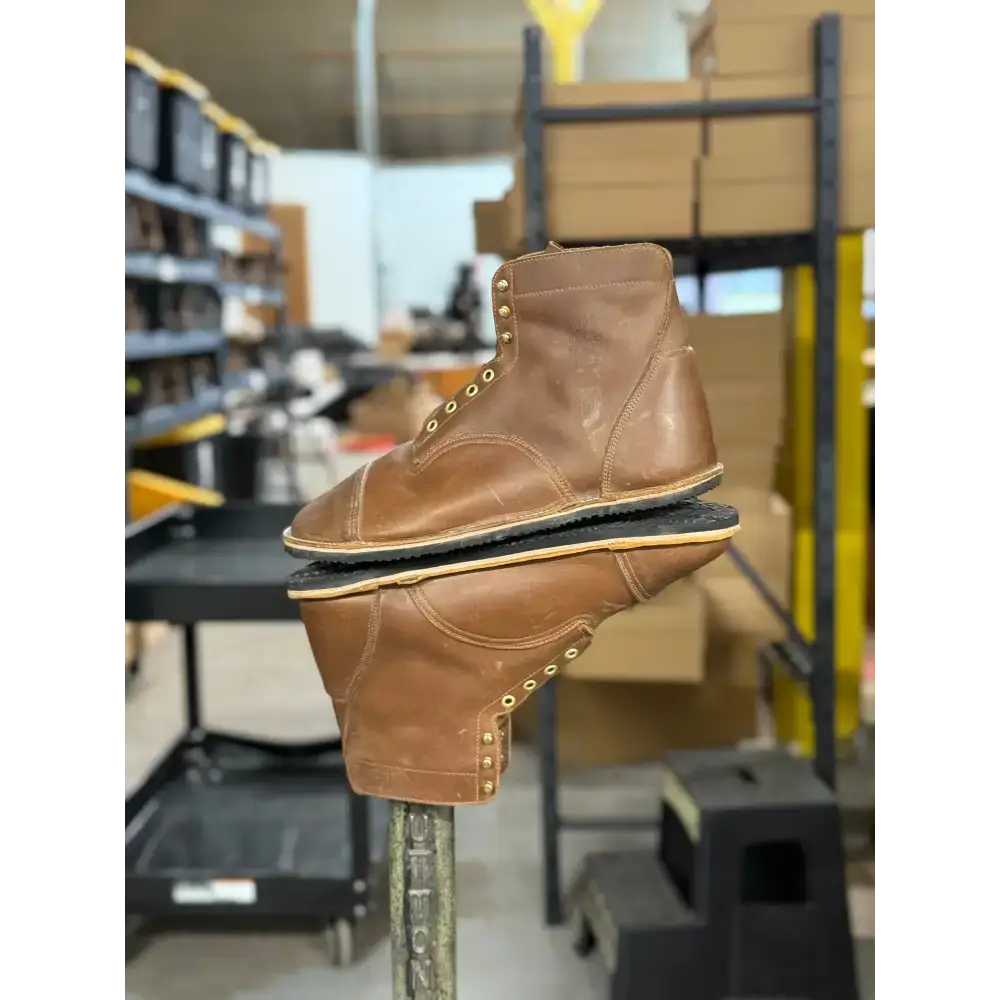 Brown leather work boot with brass eyelets from Barely Used Footwear