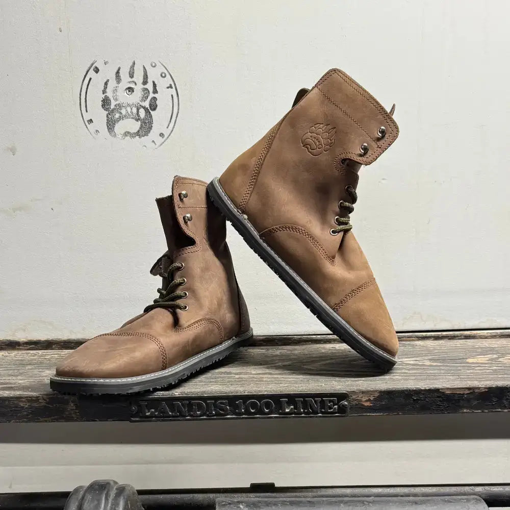 Brown suede lace-up boots from Barely Used Footwear, minor imperfections