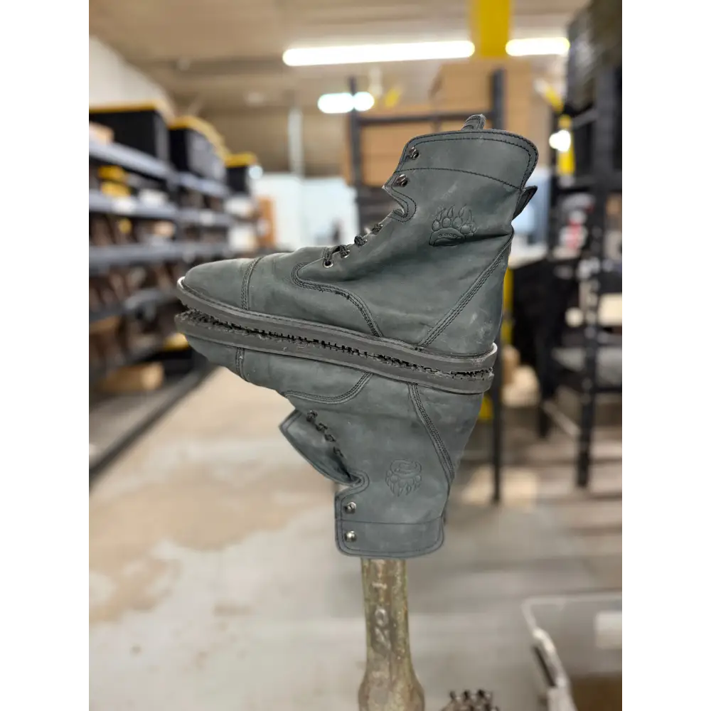 Dark gray leather work boot with stitched toe cap, embossed paw logo, minor imperfections, Barely Used Footwear