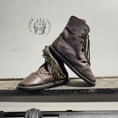 Brown leather combat boots with olive green laces from Barely Used Footwear
