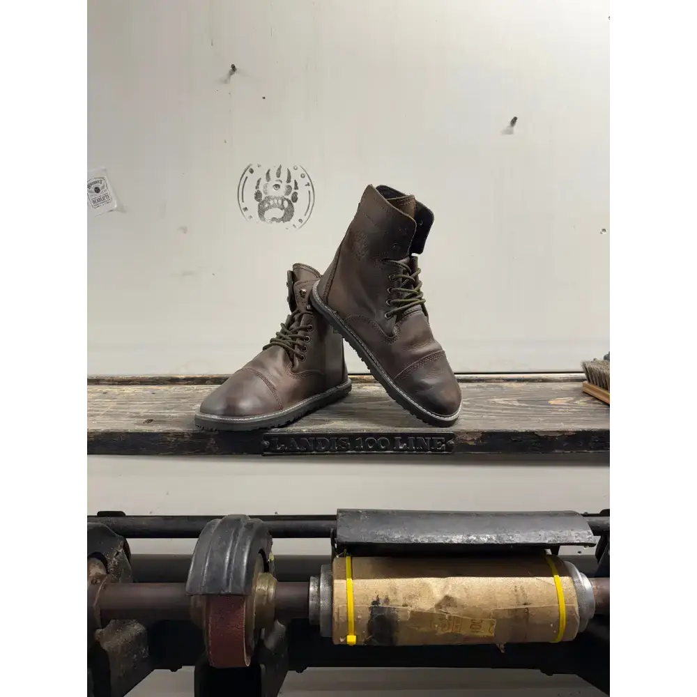 Dark brown leather work boots with laces, sturdy sole from Barely Used Footwear