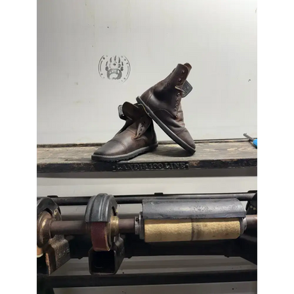 Dark brown leather work boots with stitching, eyelets from Barely Used Footwear