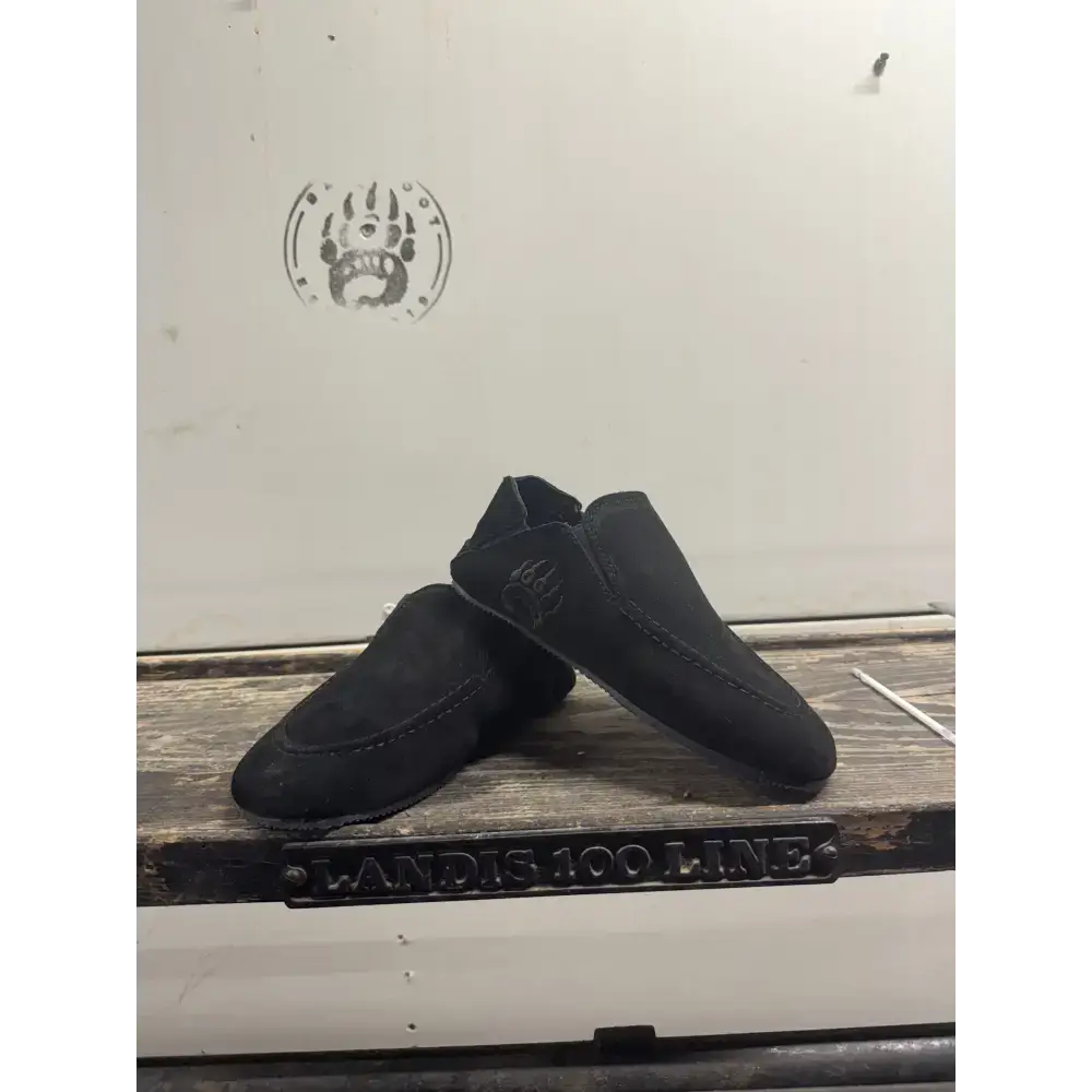 Black suede slip-on shoes from Bearly Used Footwear with minor imperfections