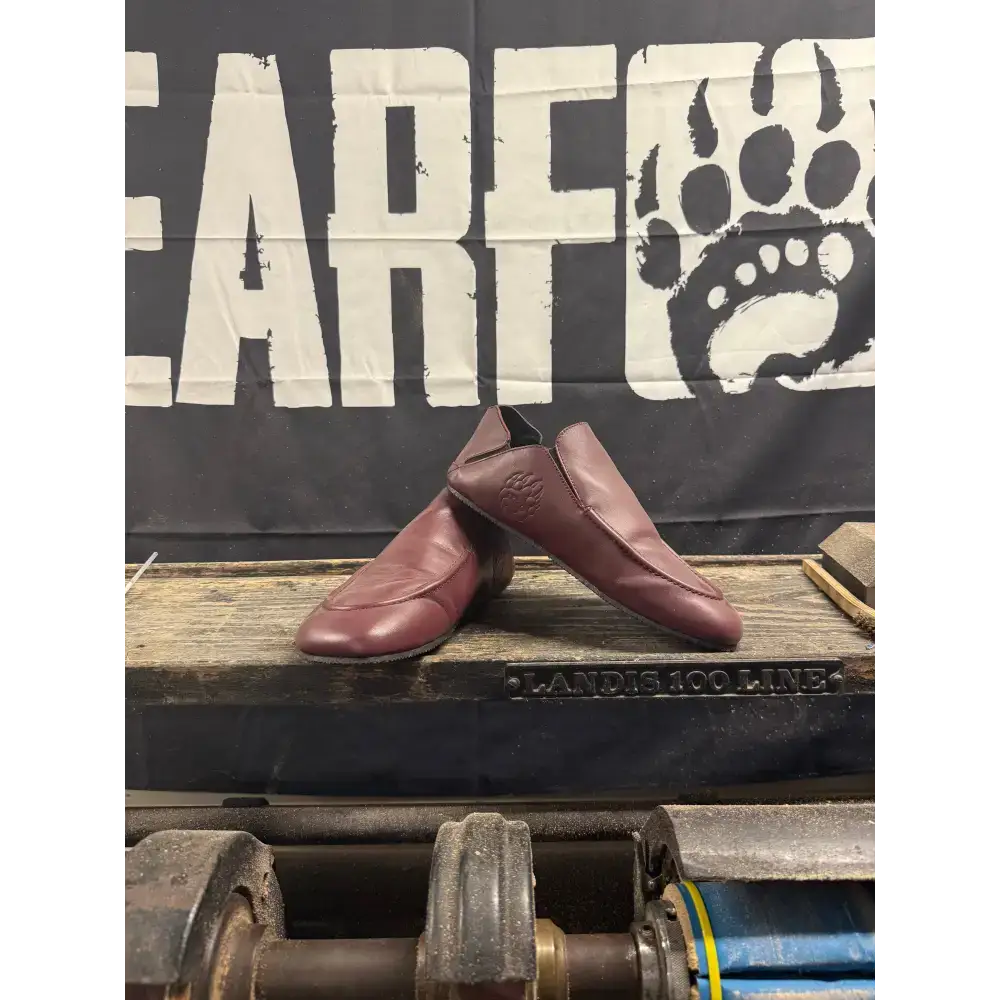 Bearly Used Footwear brown leather slip-on shoes with paw print, minor imperfections