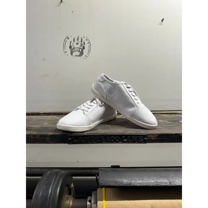 White canvas sneakers with subtle embroidered logo, Barely Used Footwear minor imperfections