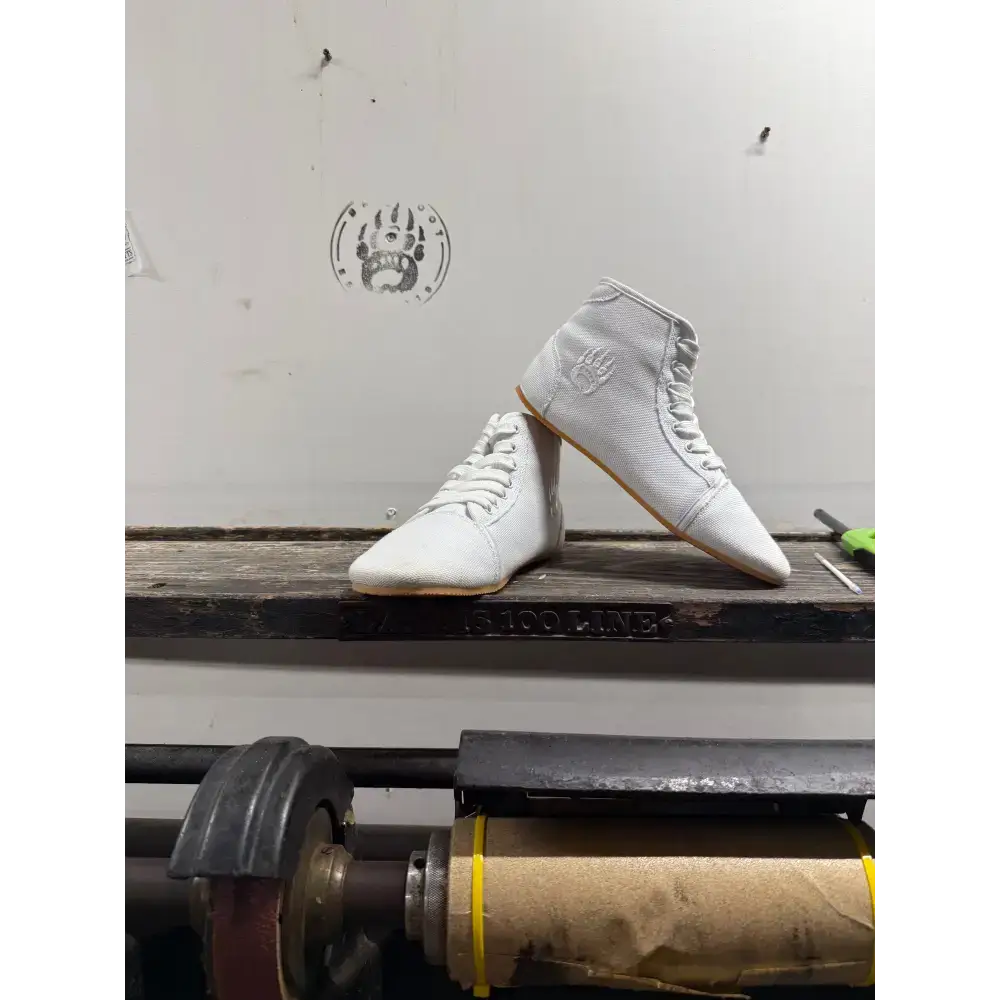 White high-top wrestling shoes with minor imperfections from Barely Used Footwear