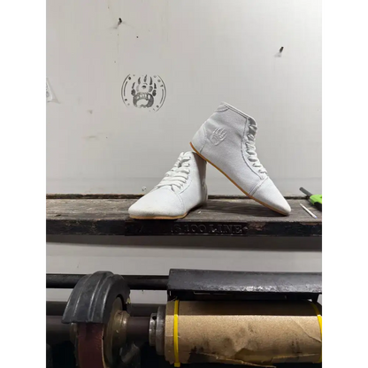 White high-top wrestling shoes with minor imperfections from Barely Used Footwear