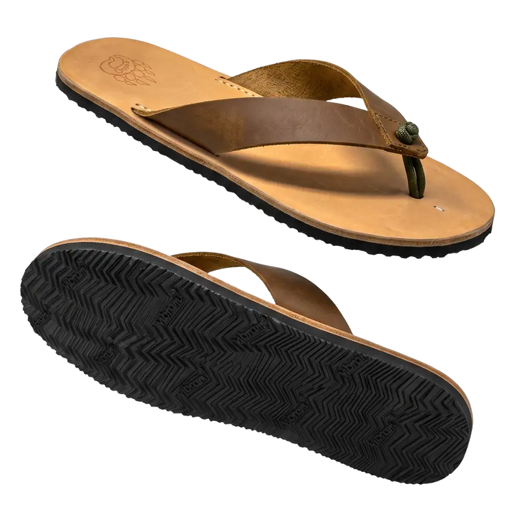 Brown leather flip-flops with a textured black rubber sole and a green cord detail on the toe strap.