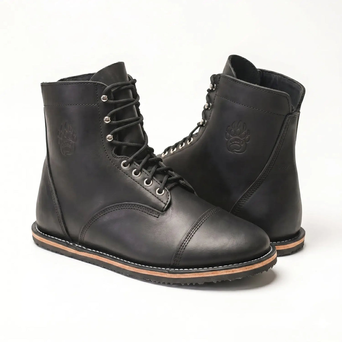 Bruin Patriot Dark black leather lace-up boots with embossed paw print, tan stitching, crazy horse leather, zero-drop sole