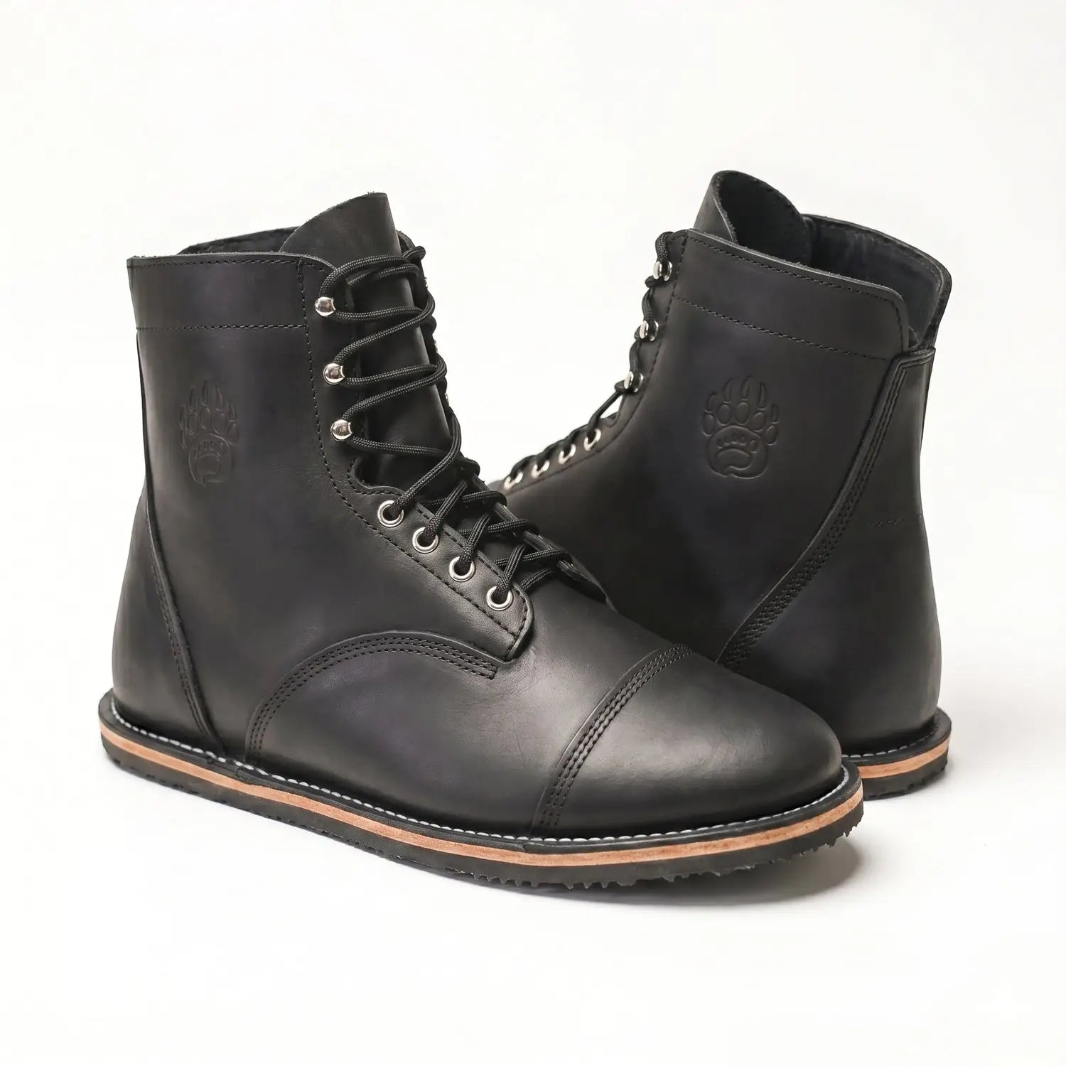 Bruin Patriot Dark black leather lace-up boots with embossed paw print, tan stitching, crazy horse leather, zero-drop sole