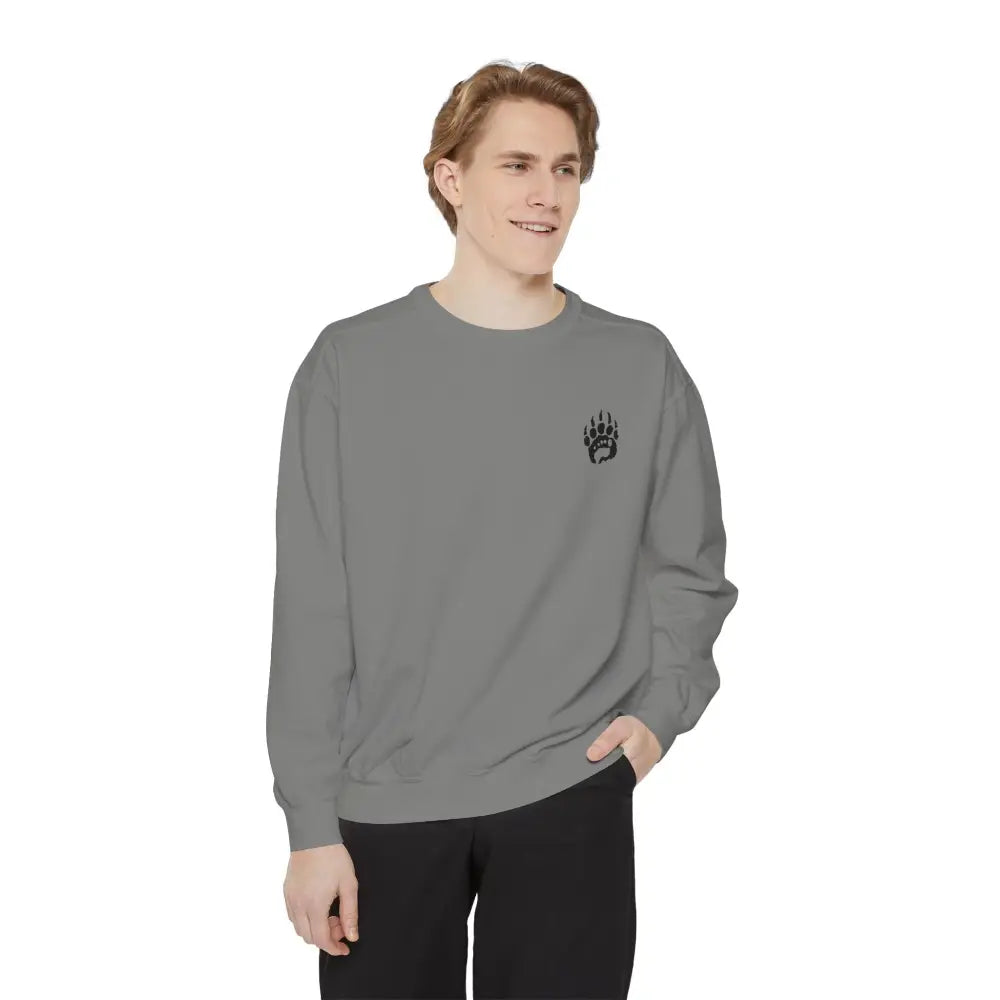 Gray garment-dyed crewneck sweatshirt with black paw print logo