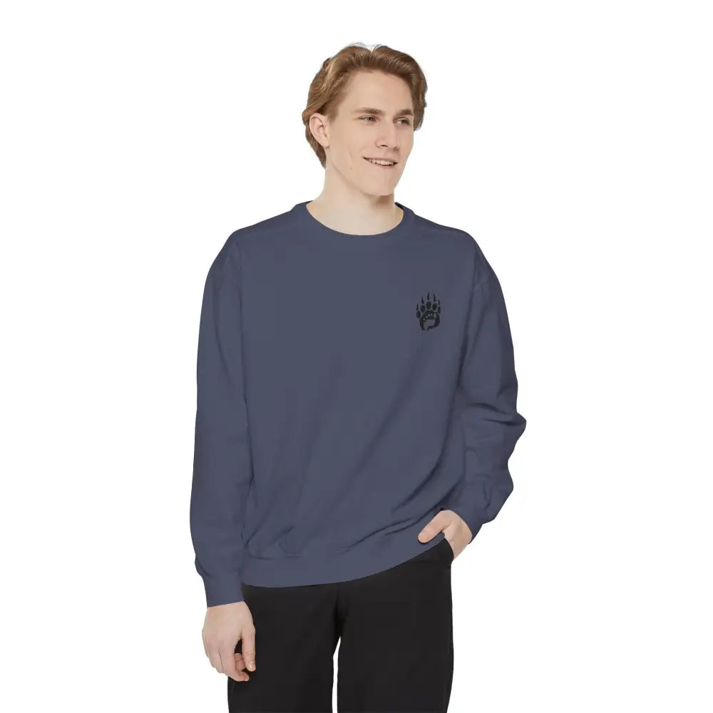 Navy blue garment-dyed crewneck sweatshirt with paw print logo