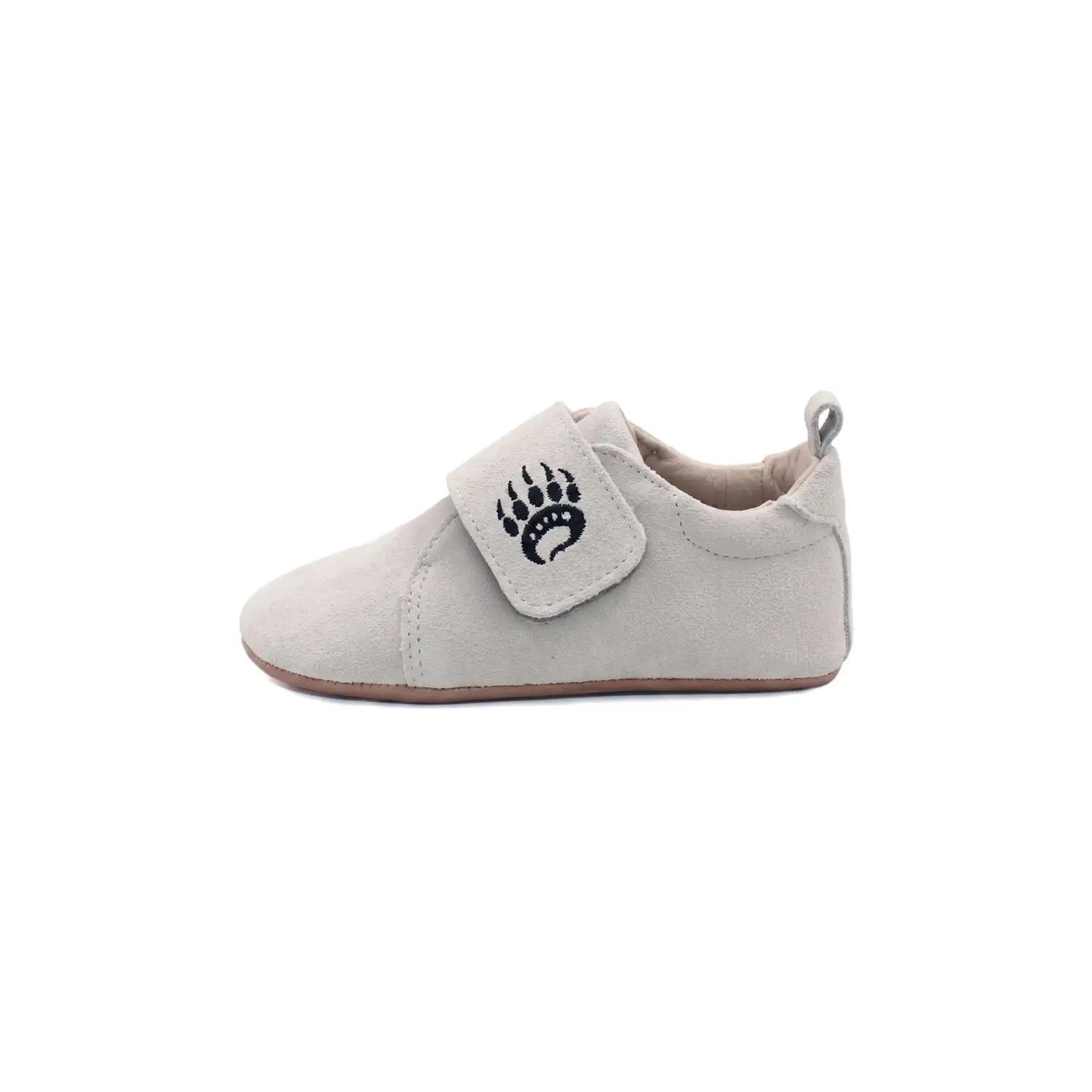 Beige suede toddler cub sv cloud shoe with black embroidered paw print velcro strap for healthy foot development