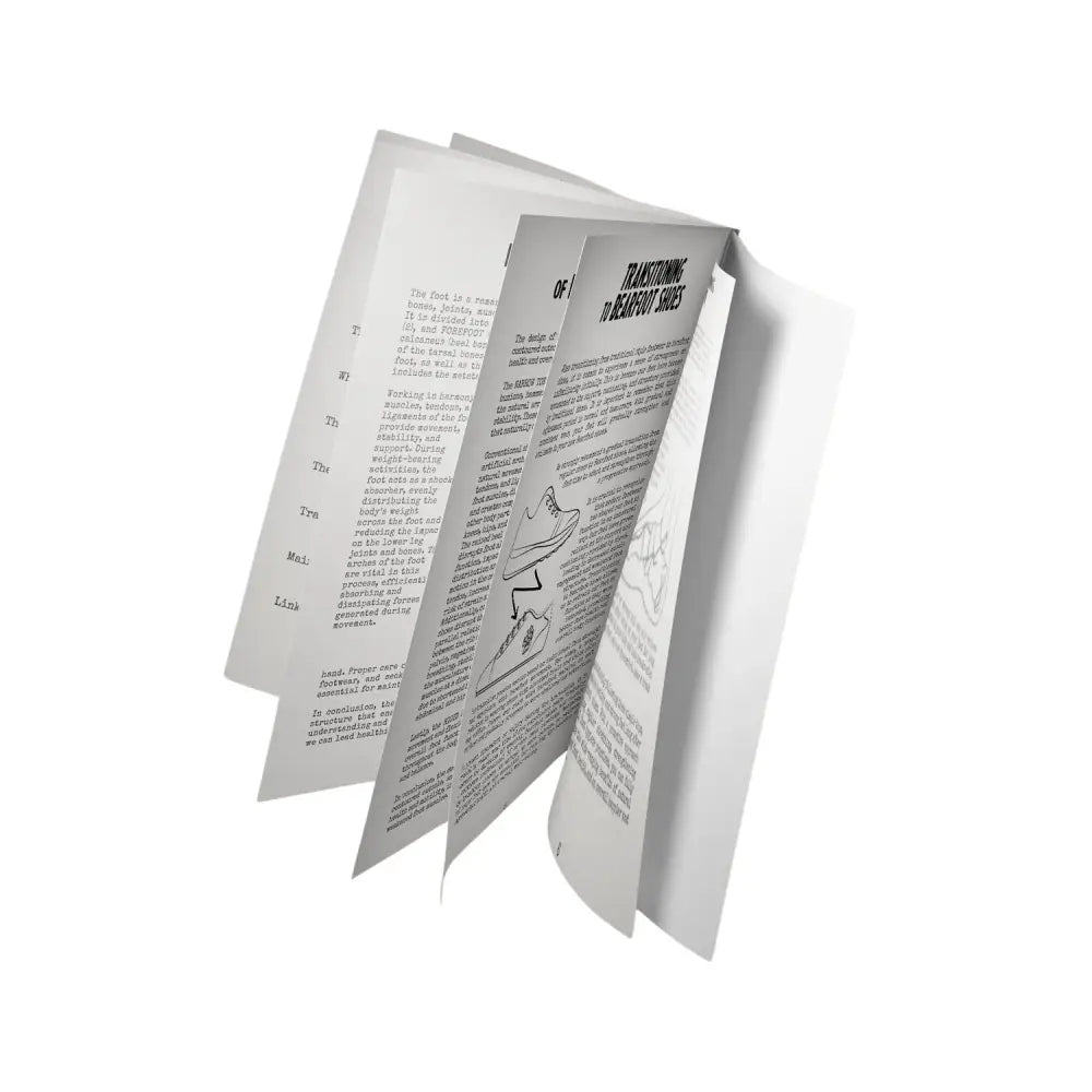 Open gray Foot Manual with black text and foot anatomy diagrams