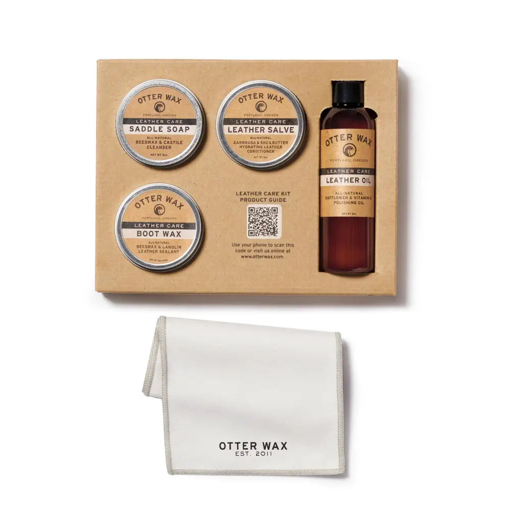 Leather care kit with brown and white containers and black labels
