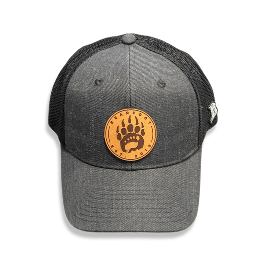 Charcoal gray leather patch trucker hat with bear paw print
