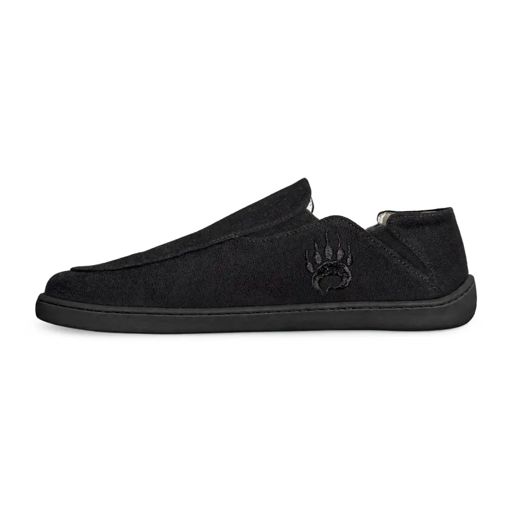 Black canvas barefoot slip-on shoe oso cg2 black with wide toe box and subtle embroidered bear paw logo on side