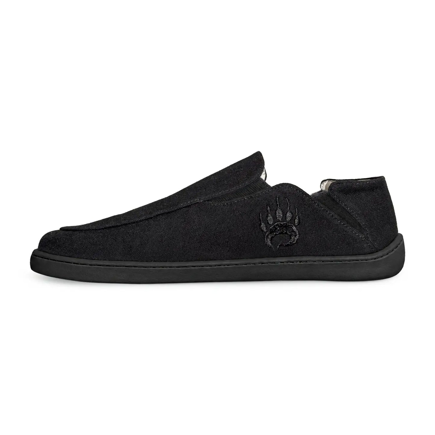 Black canvas barefoot slip-on shoe oso cg2 black with wide toe box and subtle embroidered bear paw logo on side