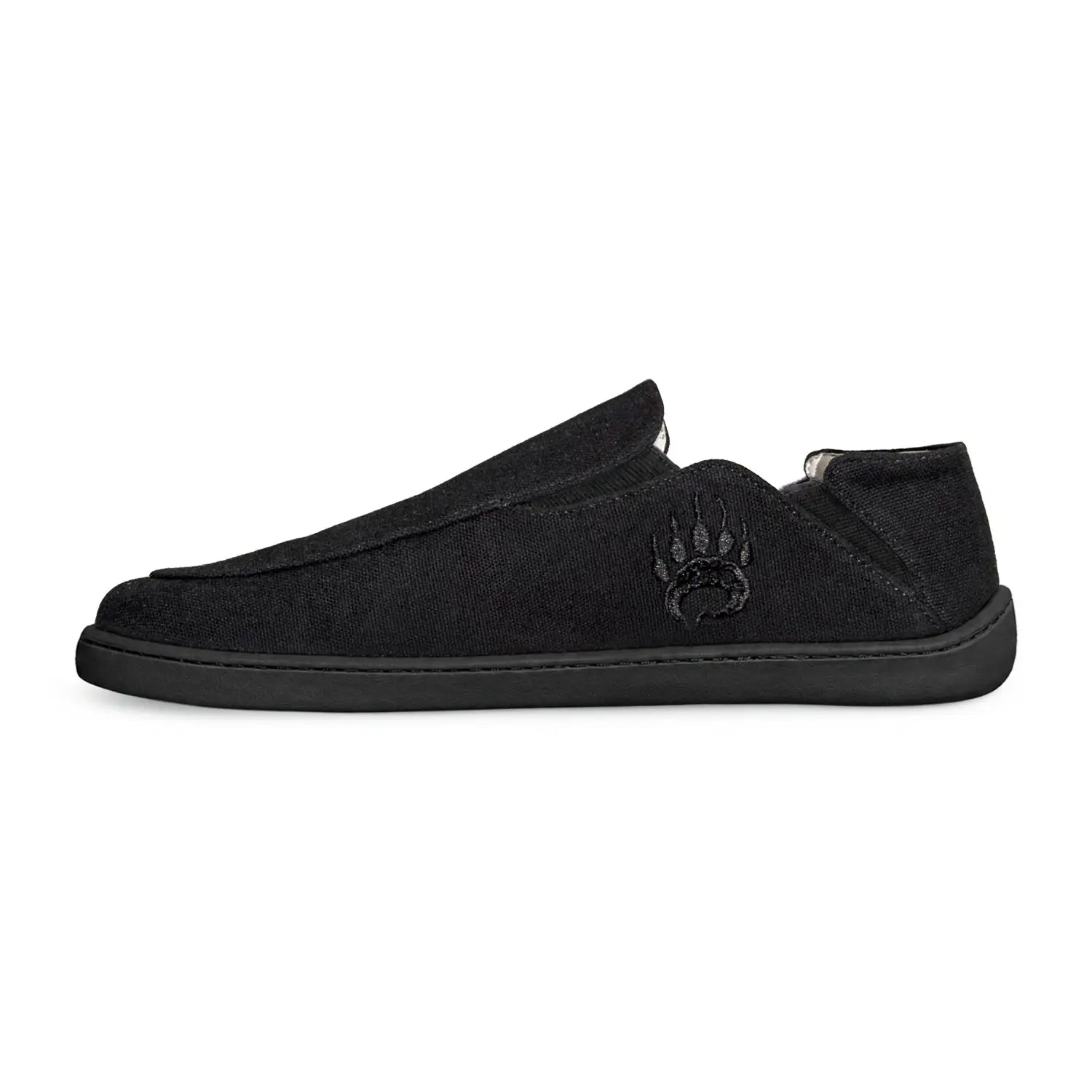 Black canvas barefoot slip-on shoe oso cg2 black with wide toe box and subtle embroidered bear paw logo on side
