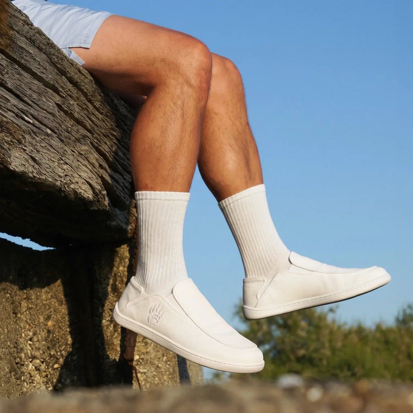 Oso CG2 white barefoot slip-on shoe with minimalist design, wide toe box, and subtle embossed logo for natural movement