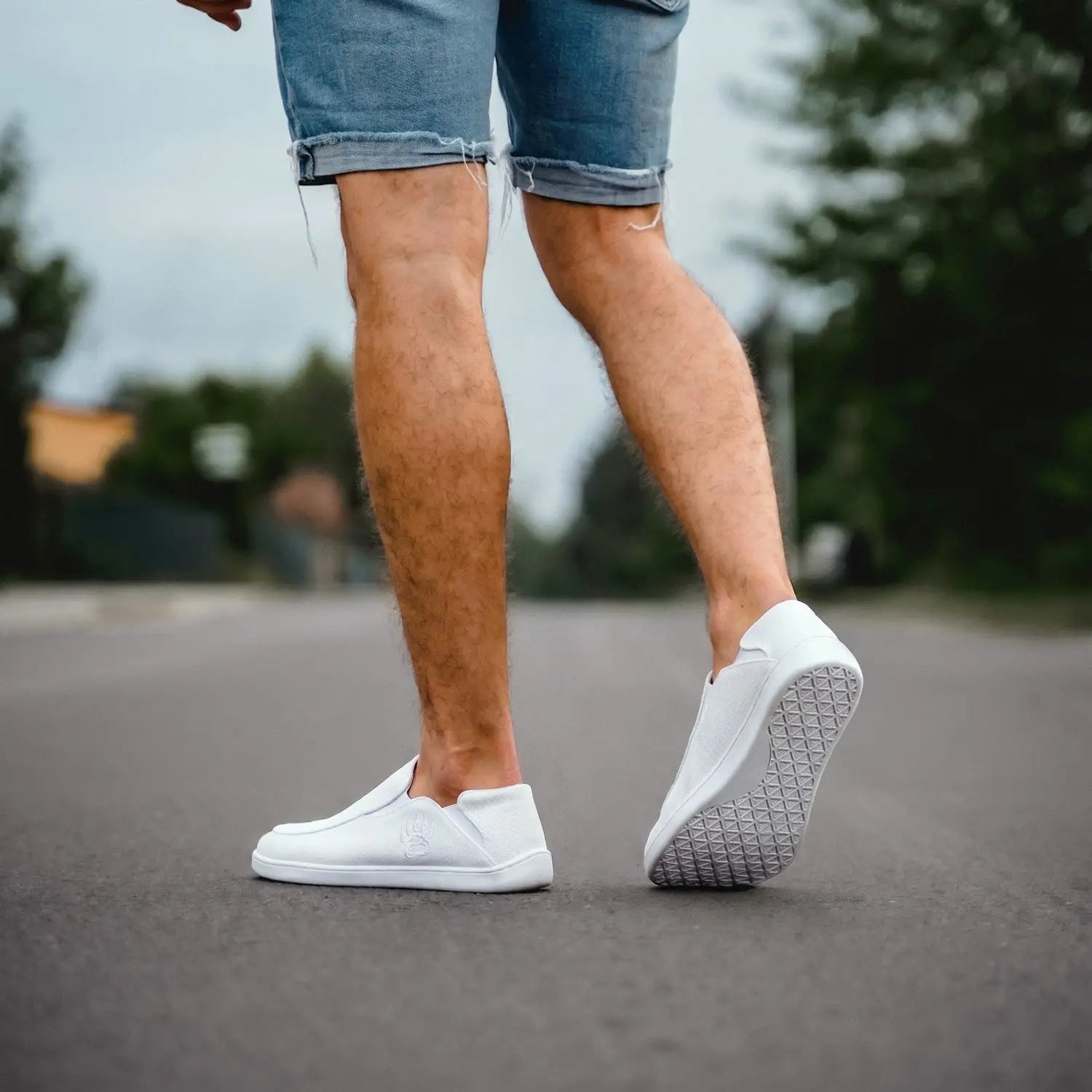 Oso CG2 white barefoot slip-on shoe with white canvas upper and textured rubber sole featuring subtle branding