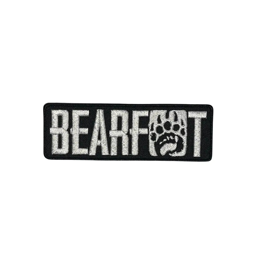 Black and white Bearfoot paw print embroidered patch on poly-cotton twill