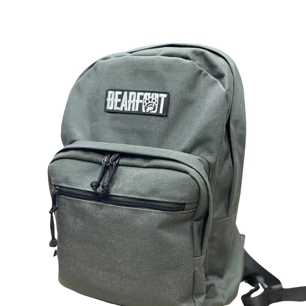 Bearfoot Patch backpack in olive green with black accents, poly-cotton twill and embroidered patches