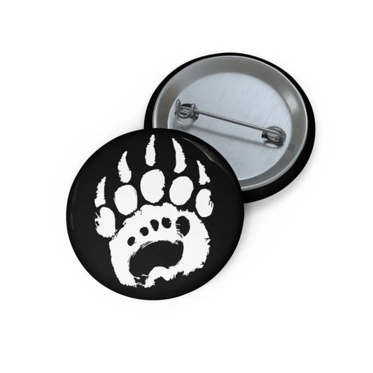 White bear paw print button pin on black background with silver fastener