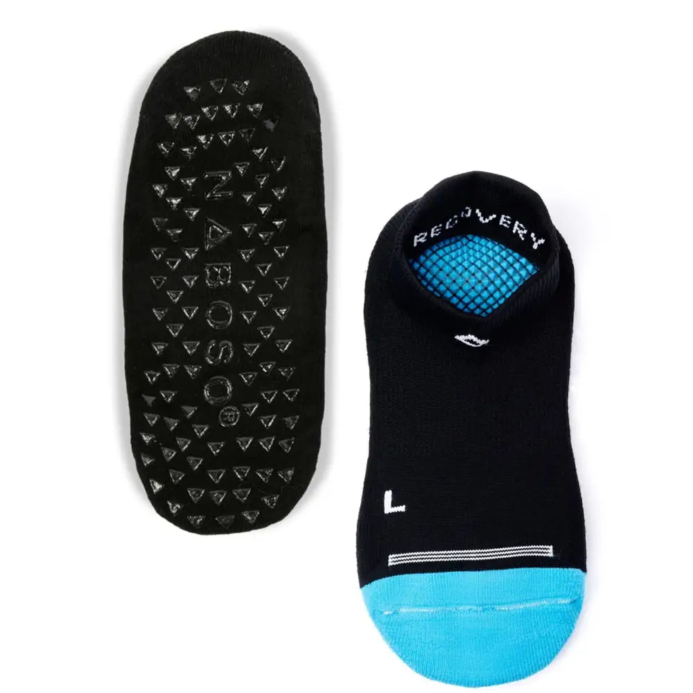 Black and teal Naboso Recovery Socks with grip sole for athletes