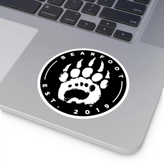 Black and white round stickers with bear paw print and bearfoot est text with protective laminate round shape