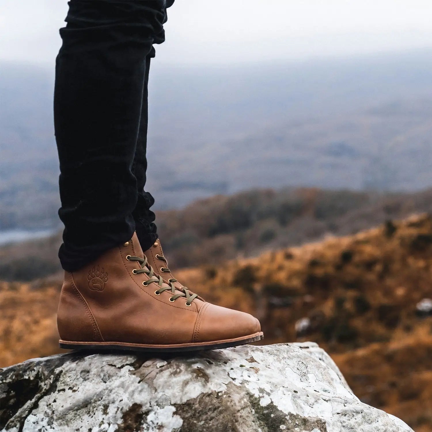 Tan crazy horse leather hiking boot ursidae with embossed paw print wide toe box and durable rubber sole