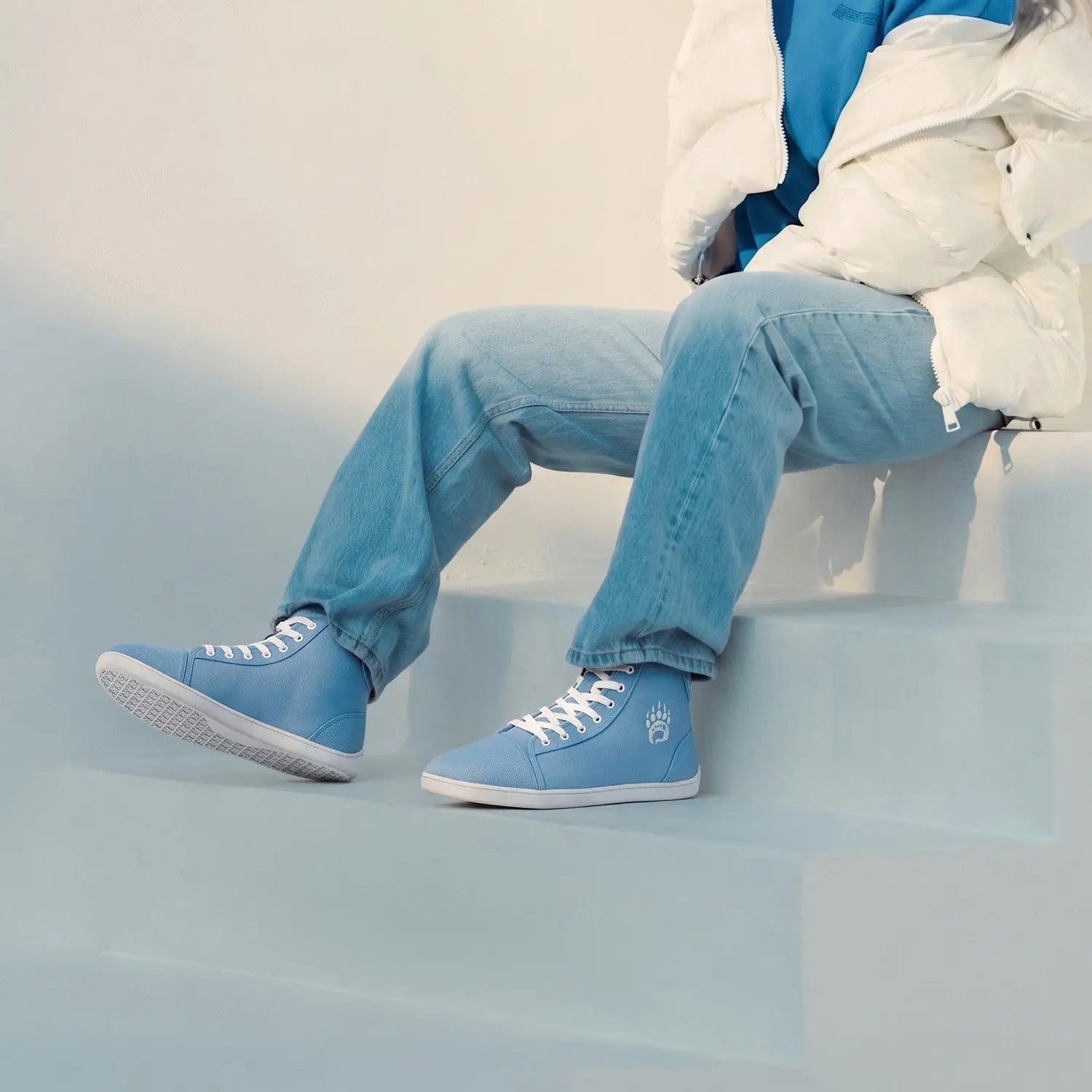 Ursus chtg2 sky blue barefoot sneaker in light blue high top with white laces and subtle paw print logo on side