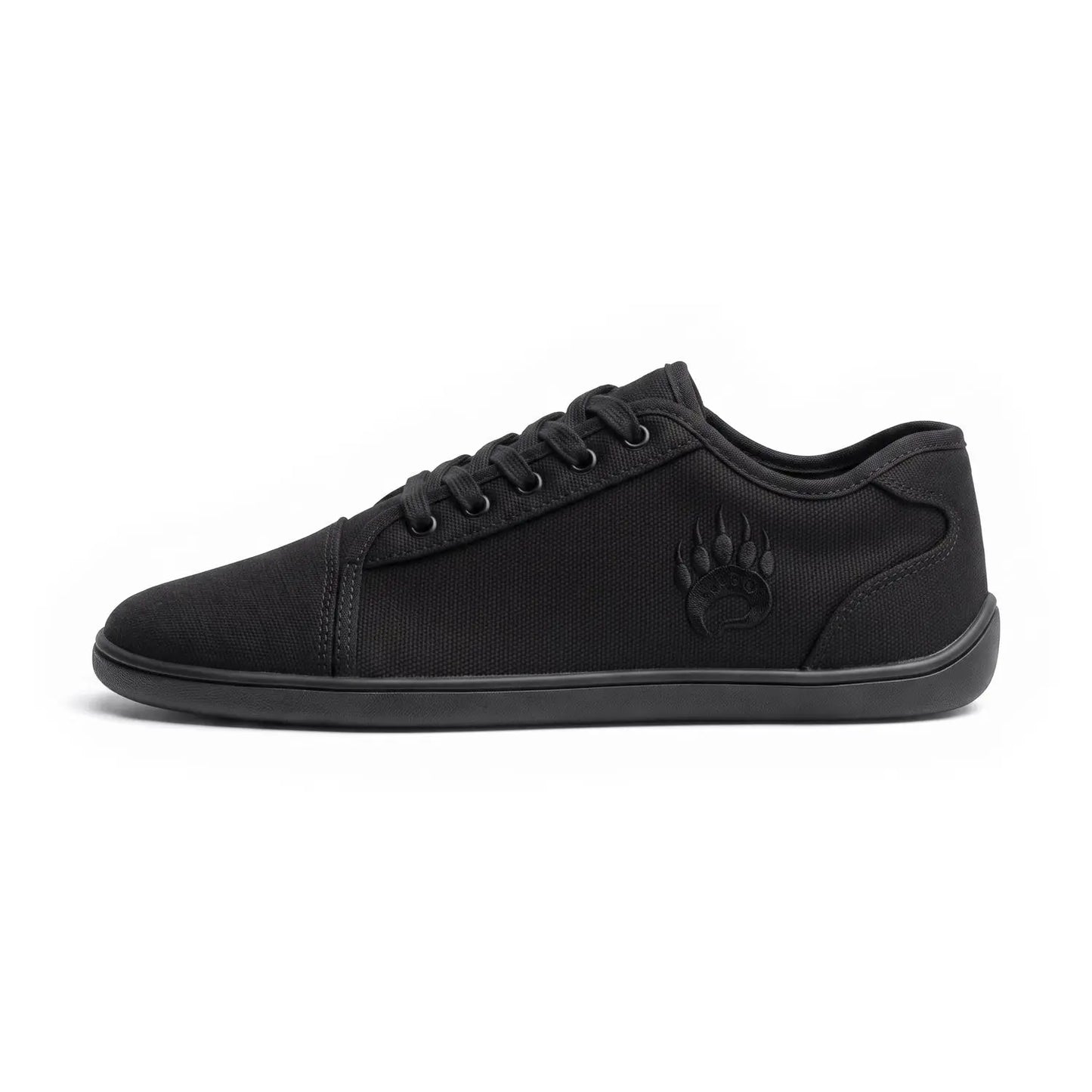 Ursus cltg2 black low-top black canvas barefoot shoe with embossed paw print logo for long-term foot health