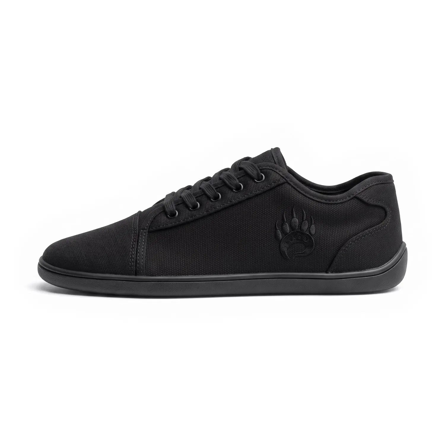 Ursus cltg2 black low-top black canvas barefoot shoe with embossed paw print logo for long-term foot health
