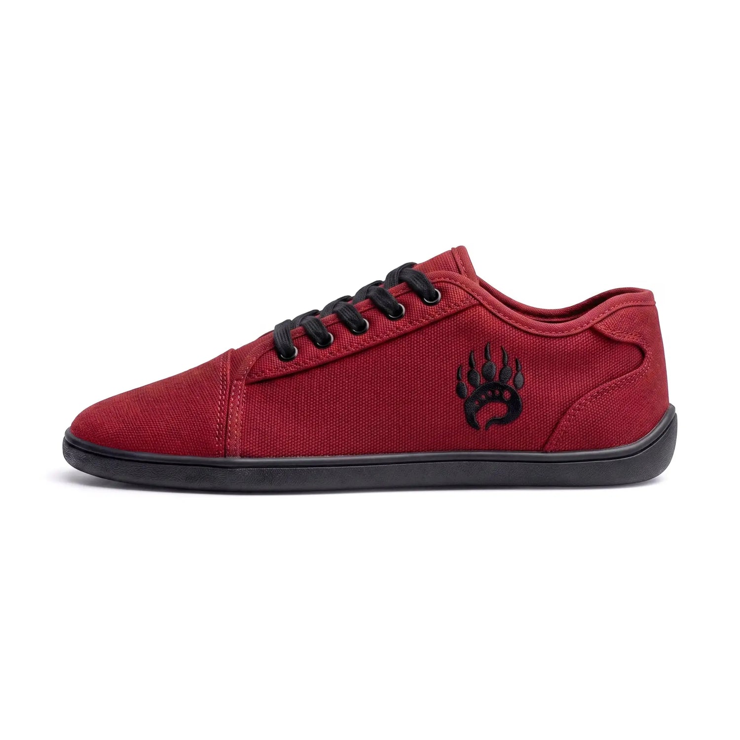 Red canvas low-top ursus cltg2 sneaker blood moon with black laces paw print logo and wide toe box