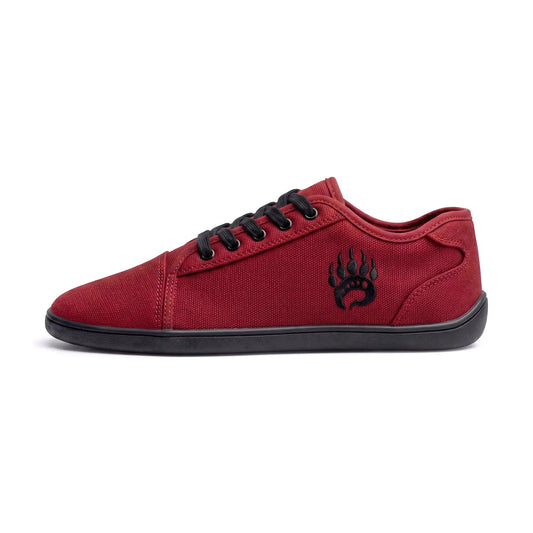 Red canvas low-top ursus cltg2 sneaker blood moon with black laces paw print logo and wide toe box
