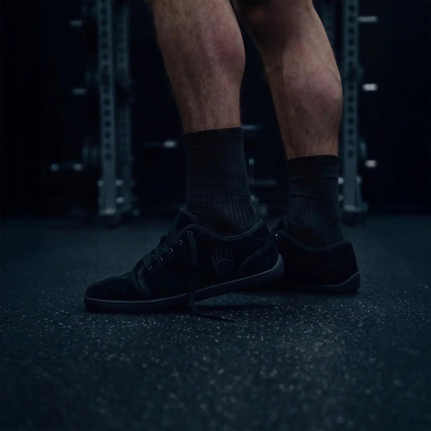 Ursus sltg2 black low-top suede barefoot shoe with natural toe splay and subtle gold logo on the side