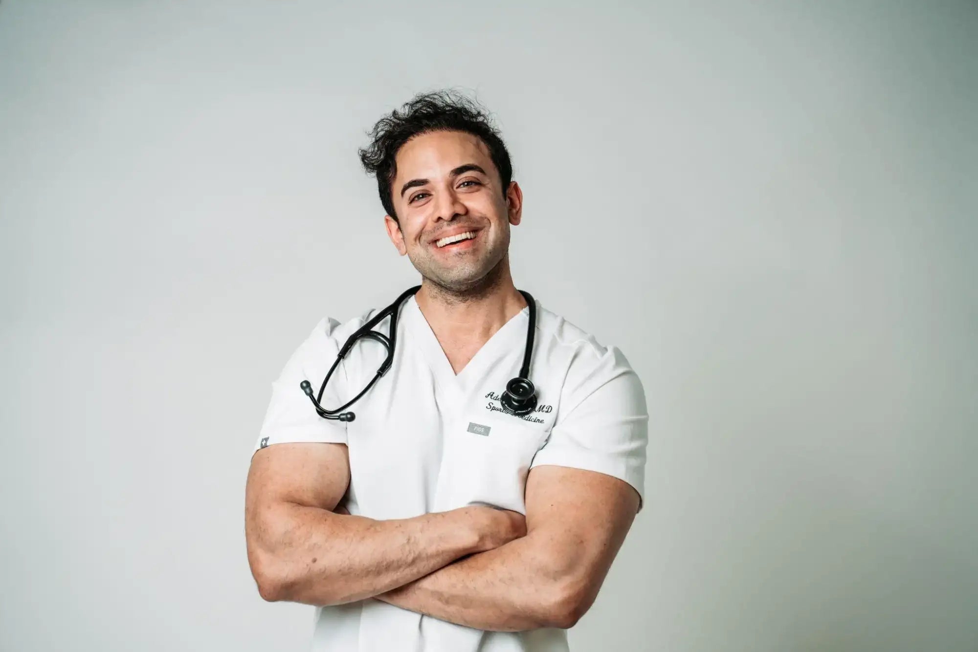 White medical scrubs with stethoscope